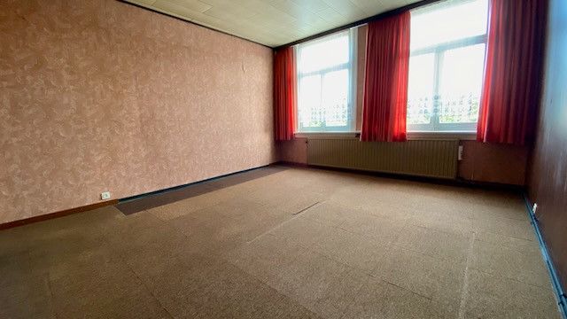 Knusse te renoveren rijwoning met 2 tot 3 slaapkamers en 2 terrassen. foto 10