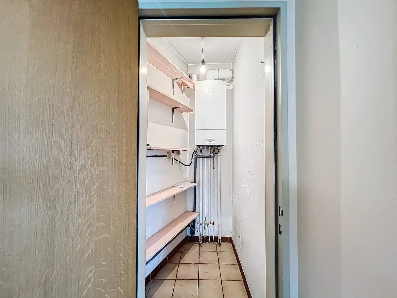 Lichtrijk appartement met 2 slaapkamers in centrum Brasschaat! foto 6