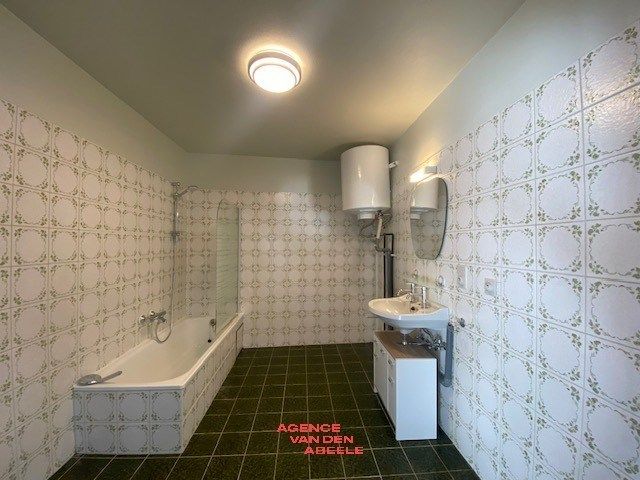 Opbrengsteigendom met 6 appartementen en 7 garages  foto 20