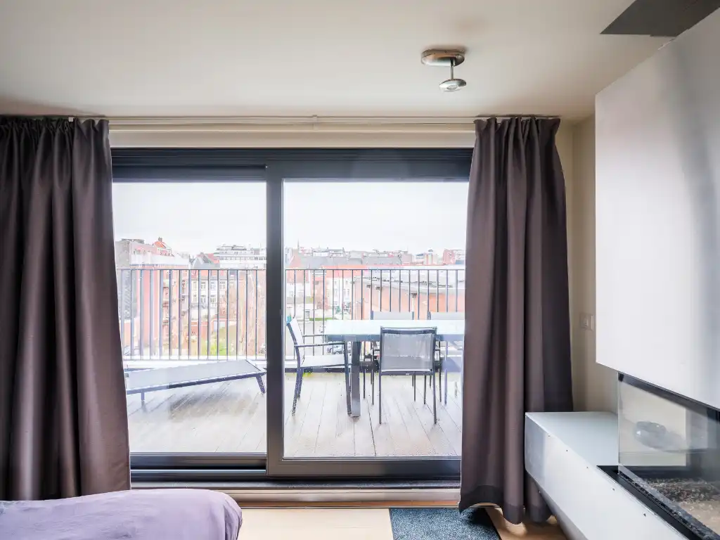 Ruim en lichtrijk duplexappartement met 2 slaapkamers, meerdere terrassen en staanplaats aan Ter Platen foto 15