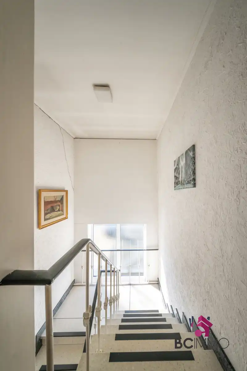 Ruime woning met praktijkruimte en 6 slaapkamers te Genk foto 24