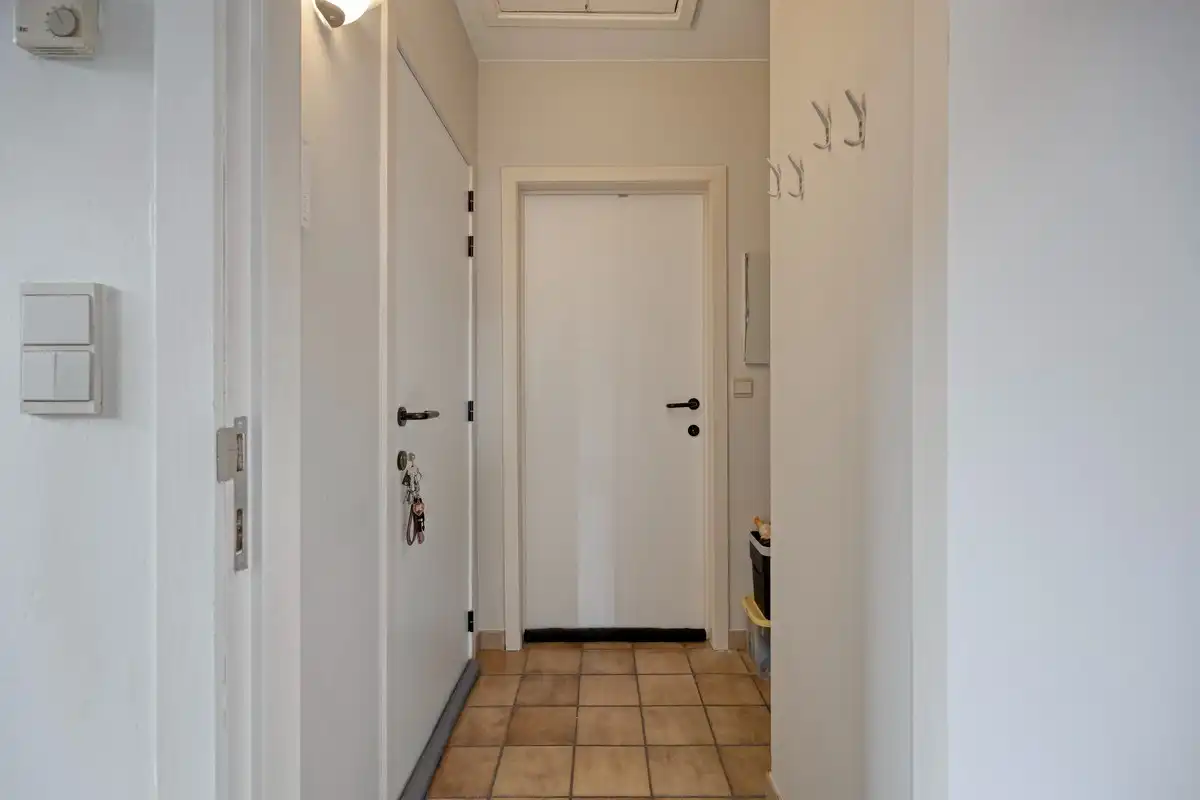 Opbrengsteigendom met 3 appartementen en 7 garages foto 13