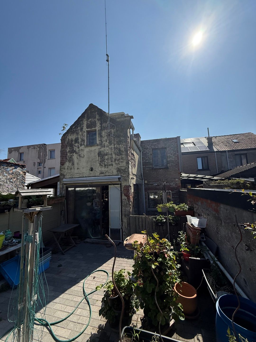 Rijwoning + ZW-gerichte Tuin (nieuw dak, ramen+zonnepanelen) foto 2