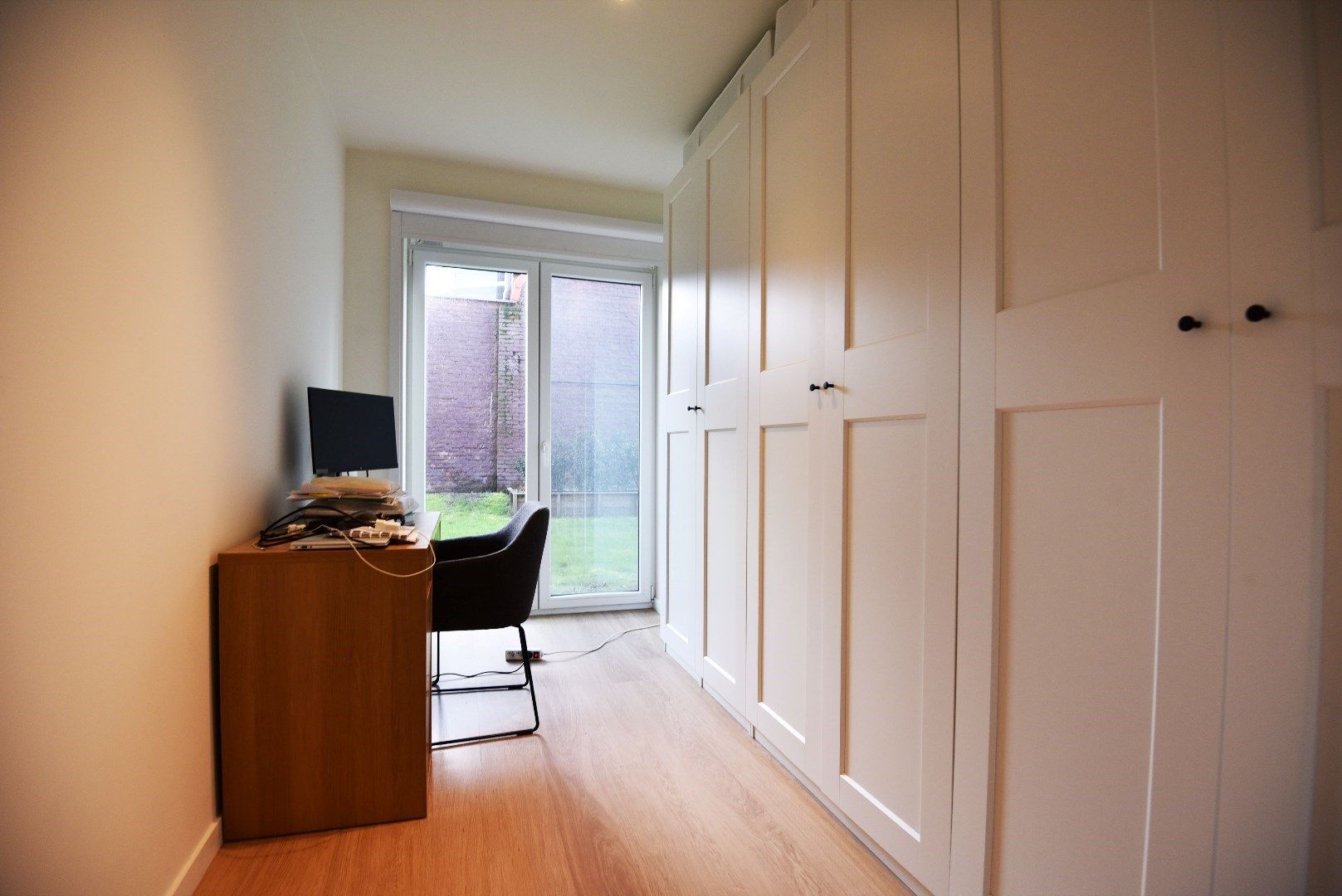 Gelijkvloers appartement met 2 slaapkamers en zonnige tuin te Maldegem centrum. foto 7