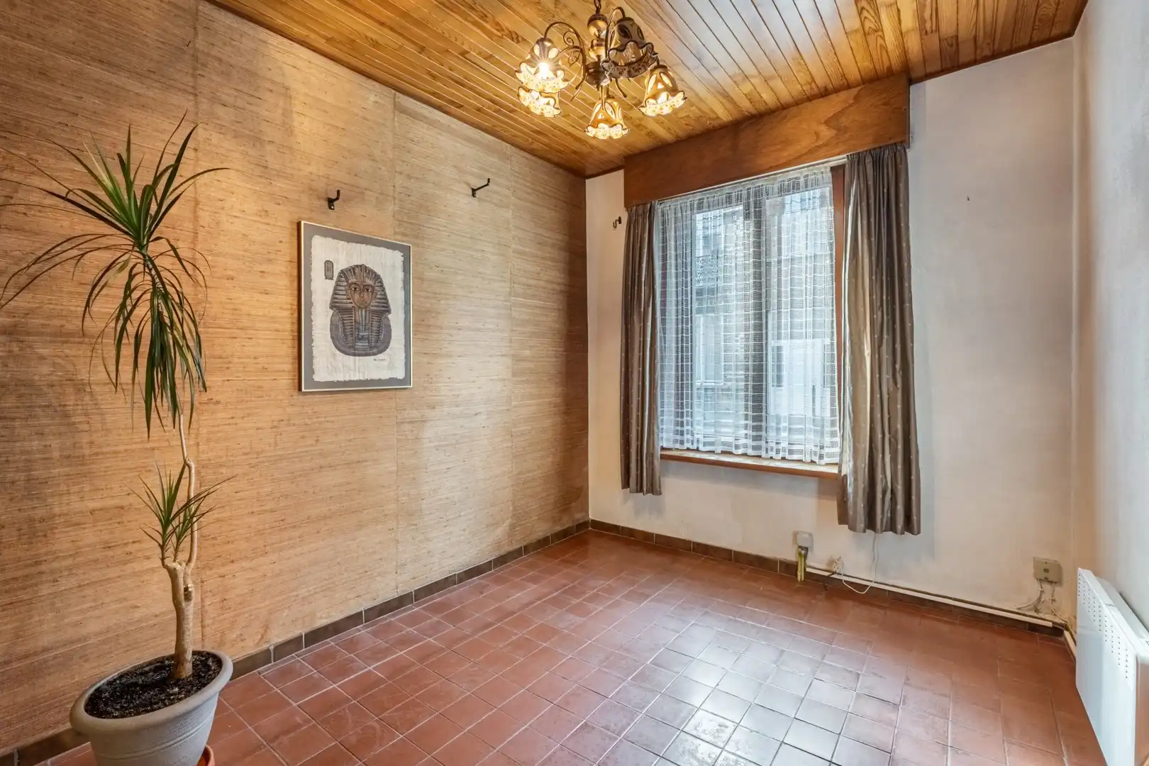 Rijwoning met veel potentieel en authentieke elementen te Evere foto 2