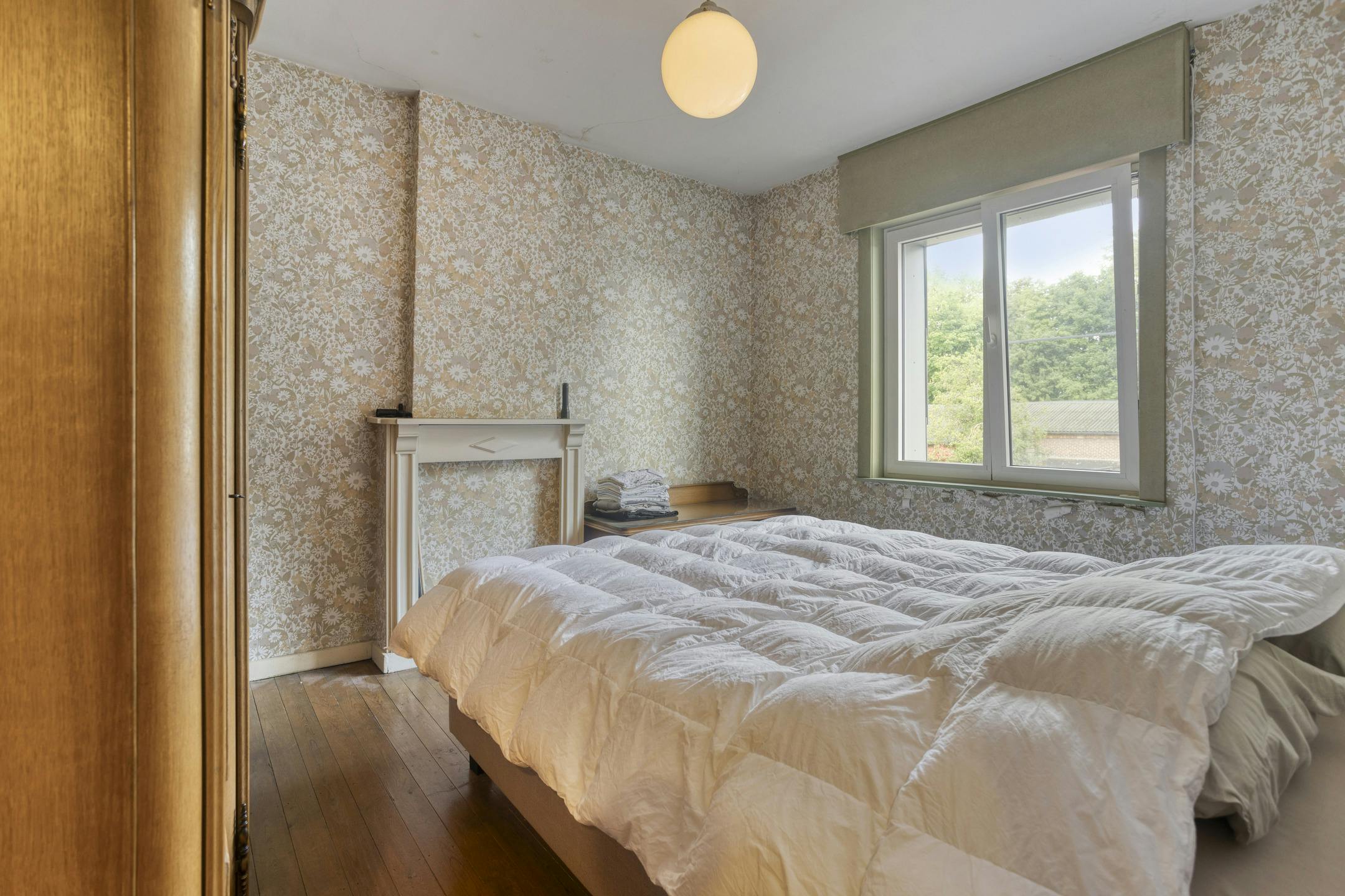 halfopen huis te koop in Kortrijk met atelier of ruime garage foto 8