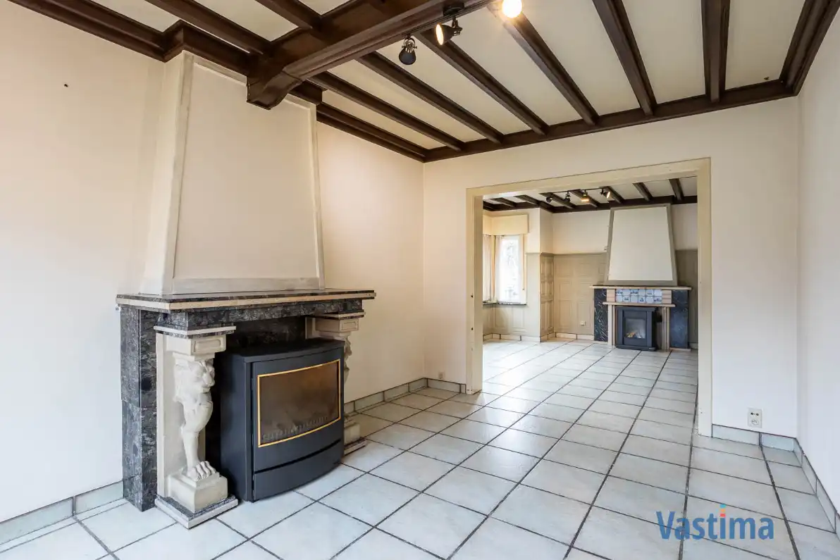 Te renoveren, halfopen woning met zuid gerichte tuin foto 4