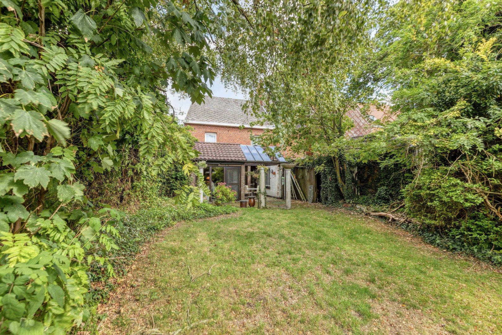 Ruim ingedeelde woning met oa 3 slpks op een gunstige locatie in het centrum foto 32