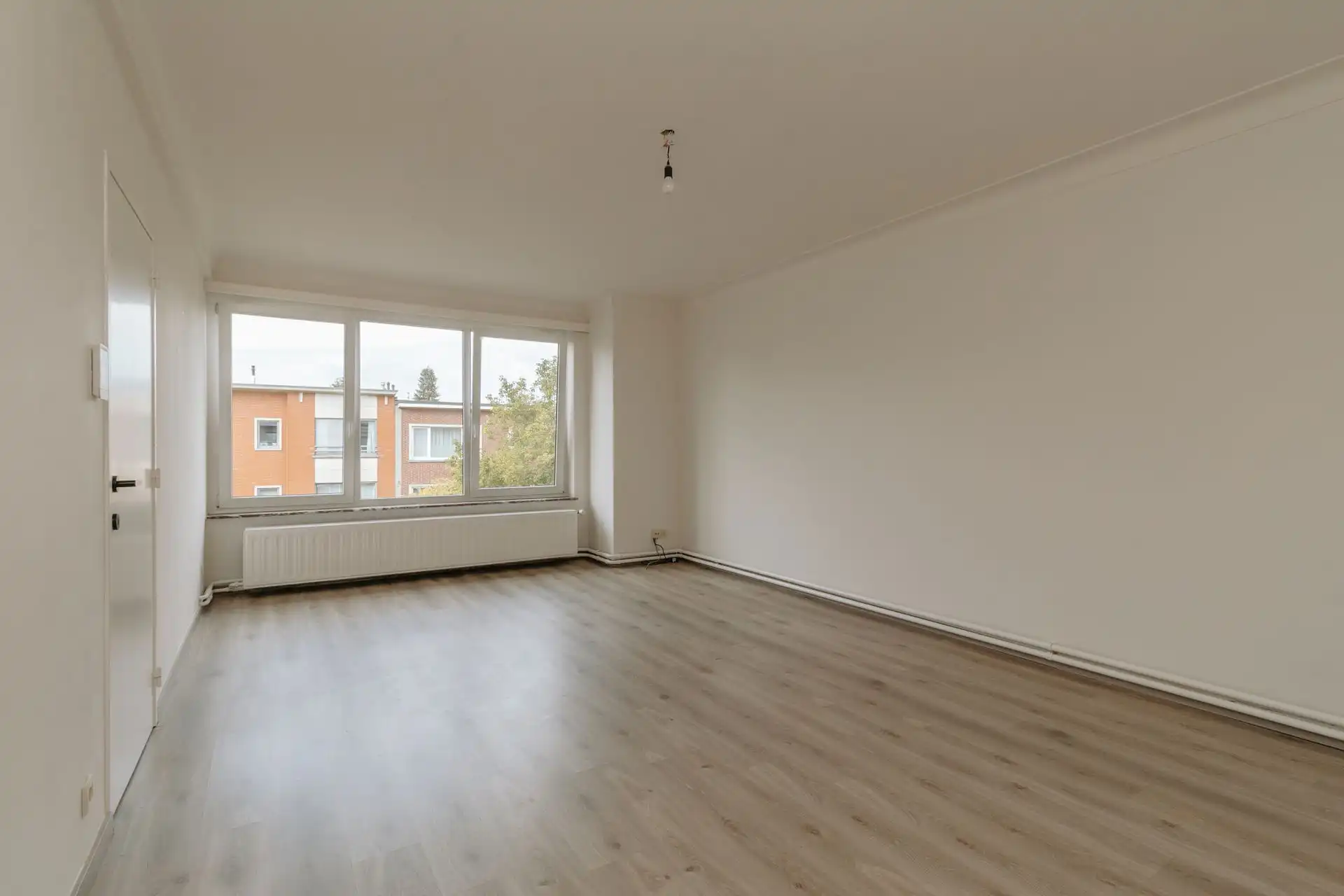 Lichtrijk 2 slaapkamerappartement op centrale ligging foto 2