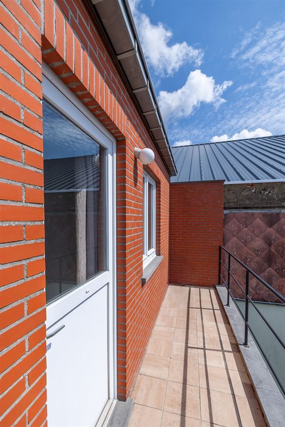 Verzorgd gebouw met handelszaak en 2 apt foto 33