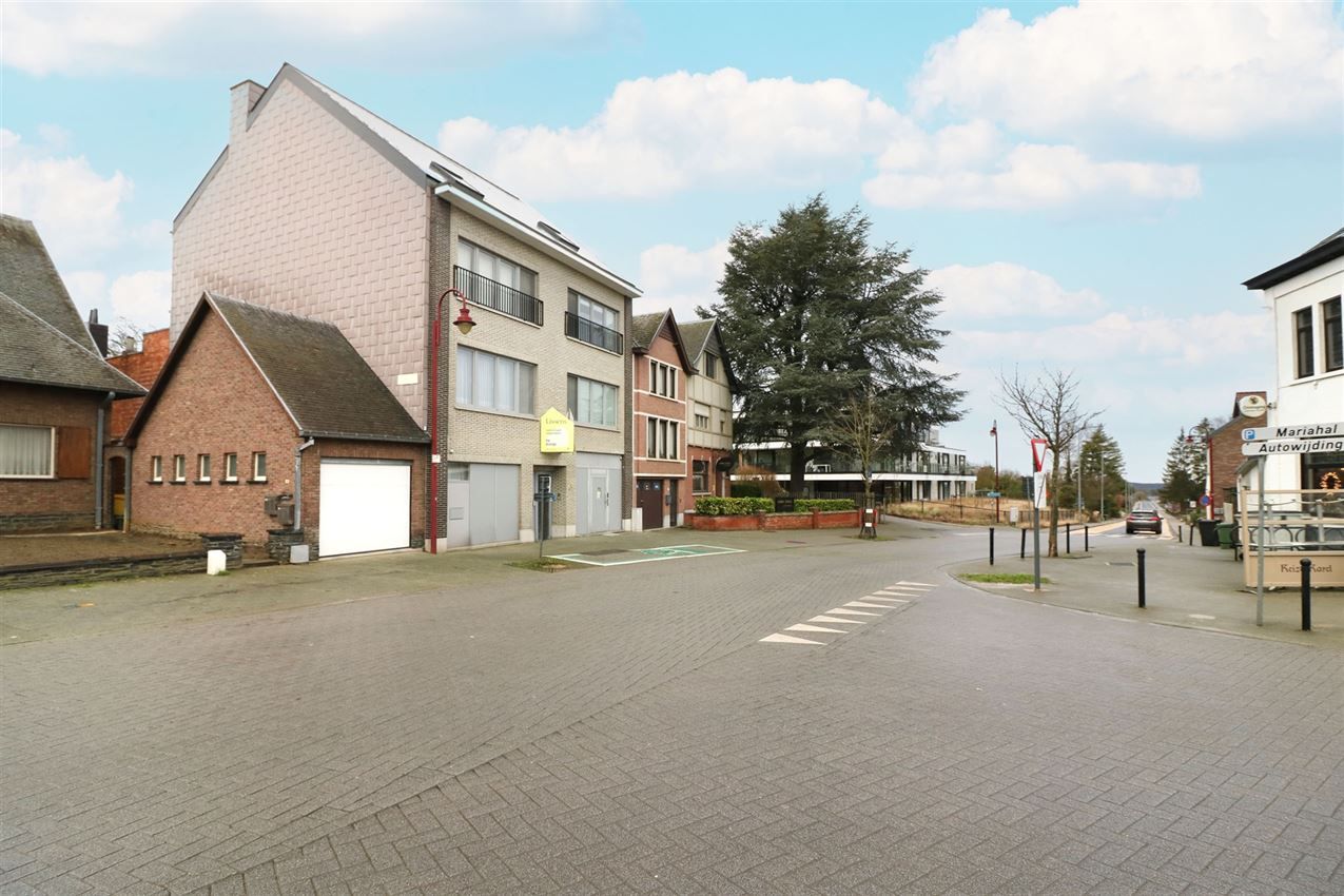 Opbrengsteigendom (handel & 4 app) op toplocatie foto 2