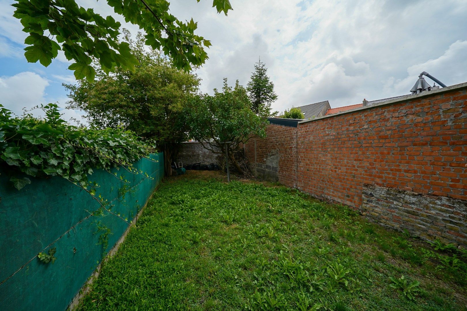 Rijwoning met 3 slaapkamers en tuin nabij de Spuikom foto 9