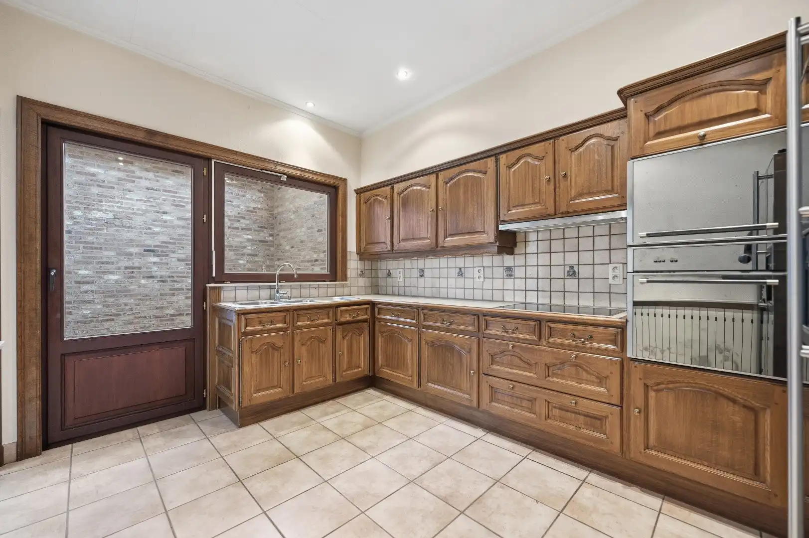 1 rijwoning en 2 appartementen in gezellig Hoegaarden foto 5