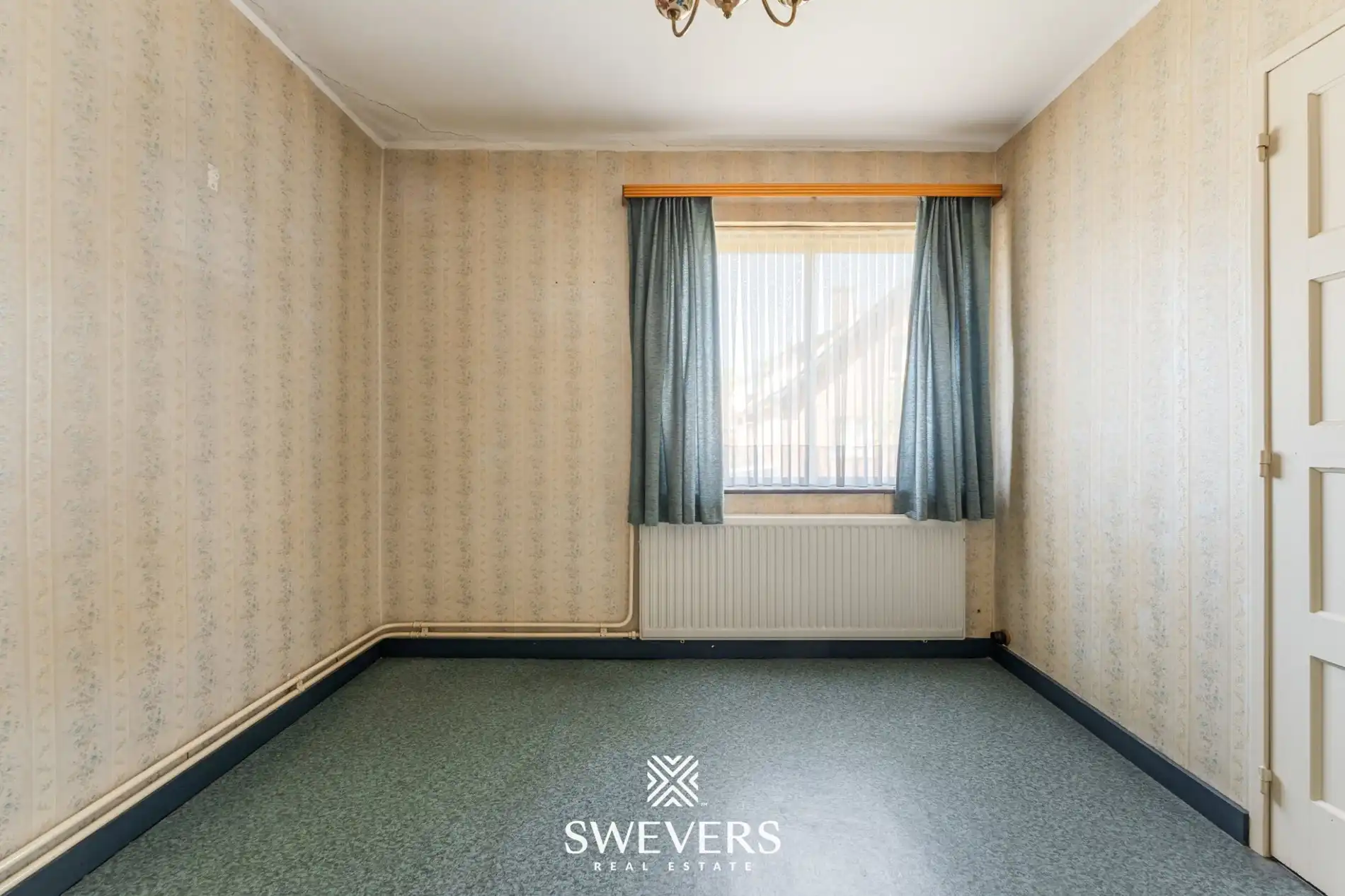 Te renoveren woning met grote tuin en 5 slaapkamers in Genk foto 21