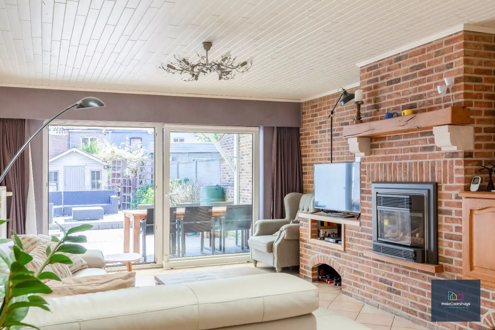 Goed onderhouden en ruime woning in rij met tuin/terras te Wondelgem foto 4