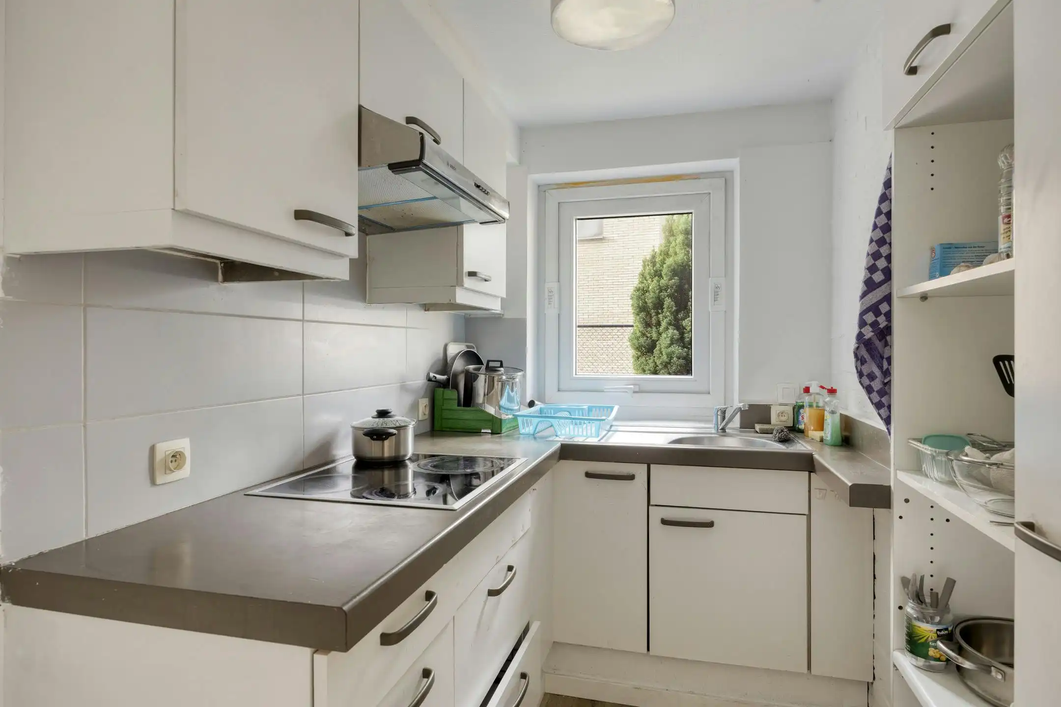 Opbrengsteigendom met 9 studentenkamers en duplex-appartement te Hasselt foto 17