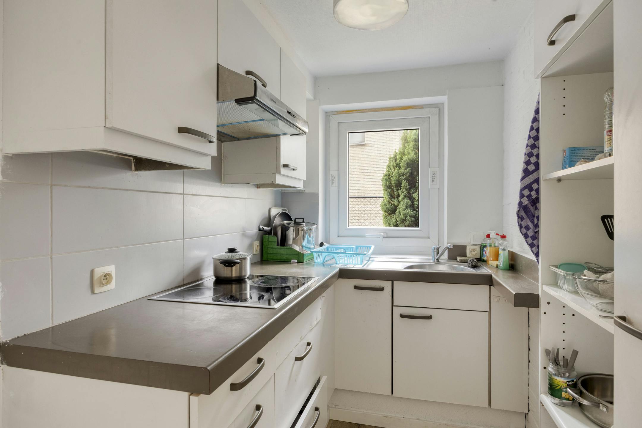 Opbrengsteigendom met 9 studentenkamers en duplex-appartement te Hasselt foto 17