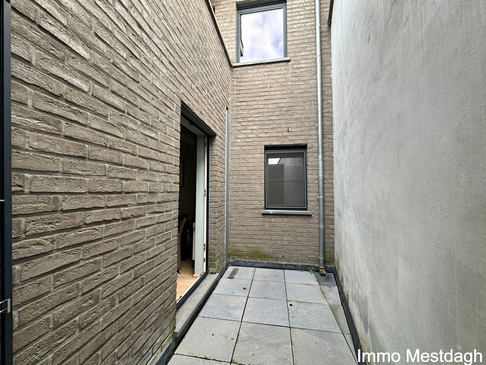 Ruim gelijkvloers appartement met tuin en autostaanplaats. foto 26