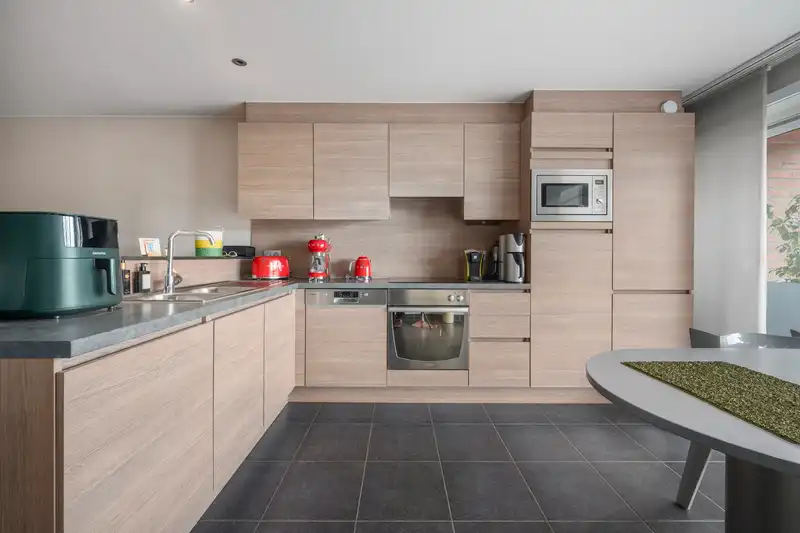 Roeselare-Centrum – Luxueus appartement met commerciële mogelijkheid foto 6