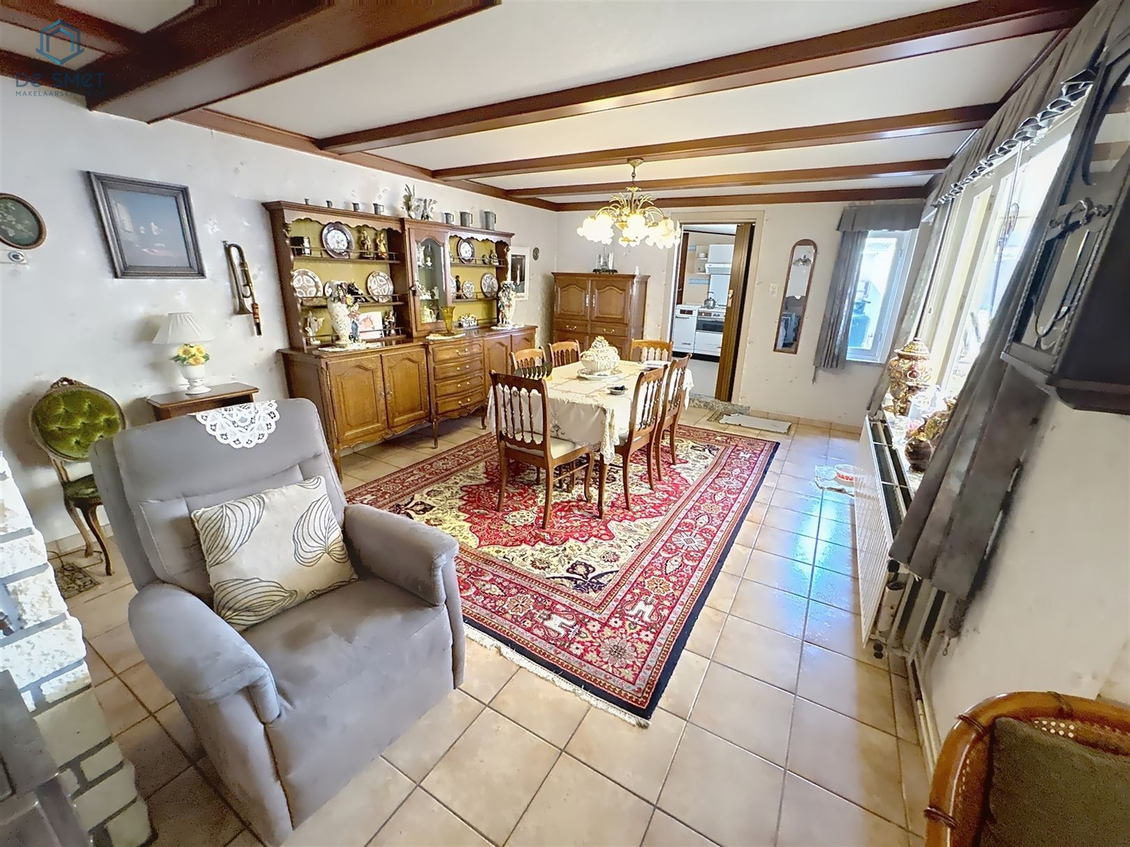 Veelzijdige Te Renoveren Woning met Handelsruimte in het Hart van Schendelbeke foto 4