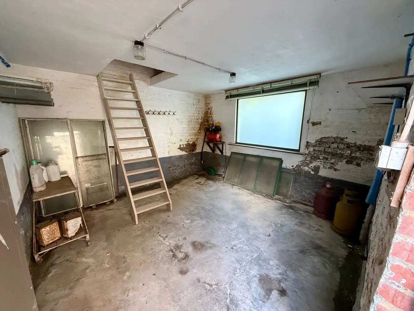 Veelzijdige woning met ruime opslagmogelijkheden te koop! foto 19