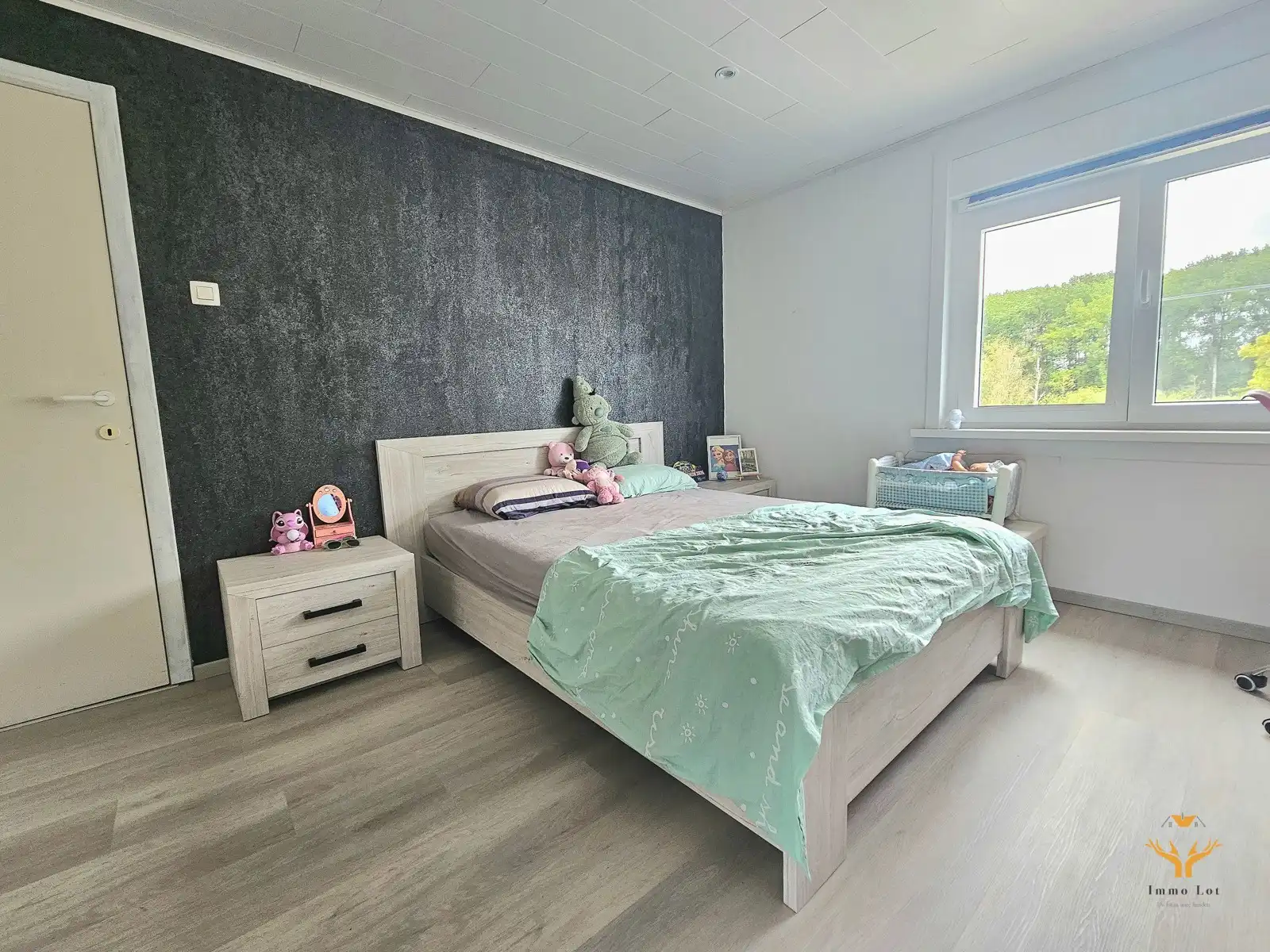 Ruime gezinswoning met tuin en garage te huur foto 8