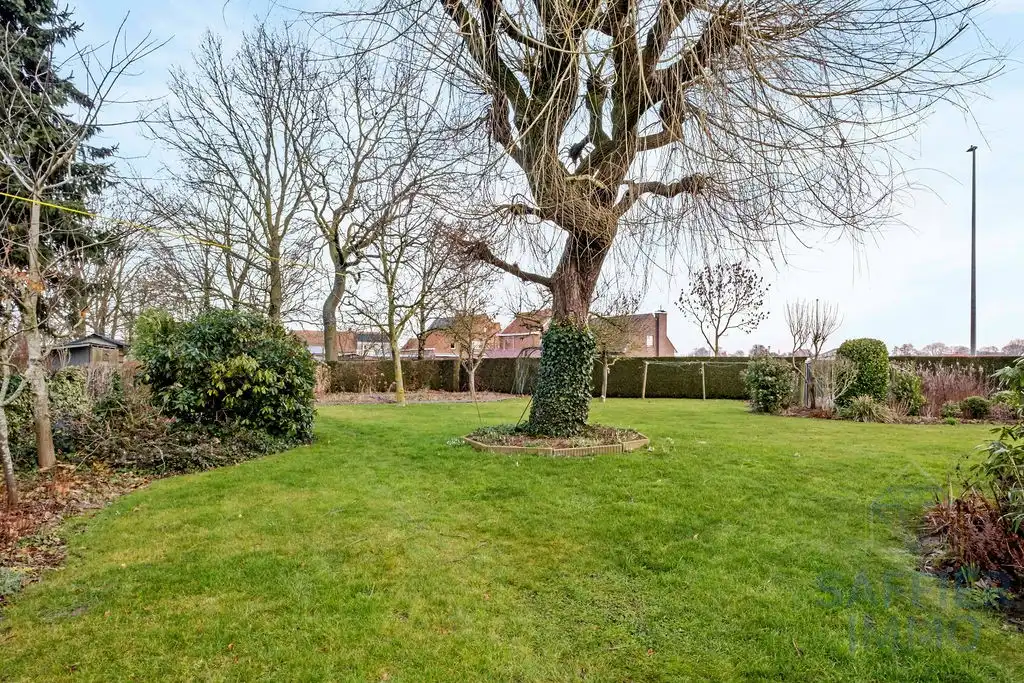 Ruime woning met 4 slaapkamers en grote tuin in het centrum van Ingelmunster foto 12