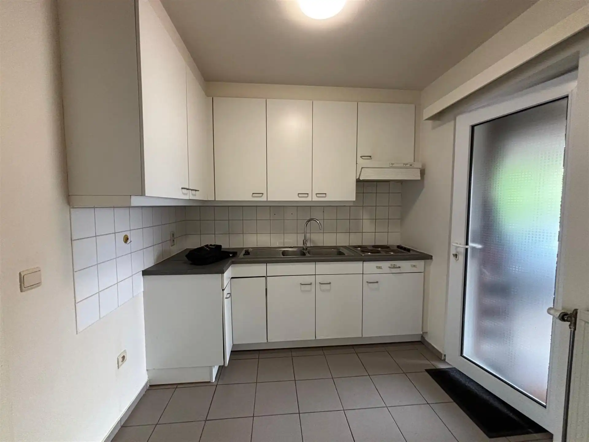 Ruim gelijkvloers appartement nabij station en centrum foto 5
