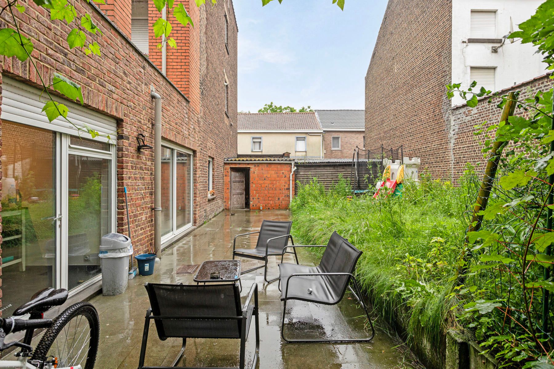 Opbrengstpand met 3 appartement en bouwgrond te Haren. foto 13