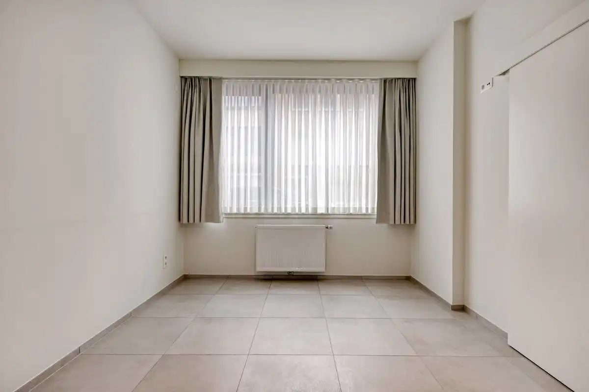 Assistentiewoning met 2 slaapkamers te koop in centrum Kortrijk! foto 8