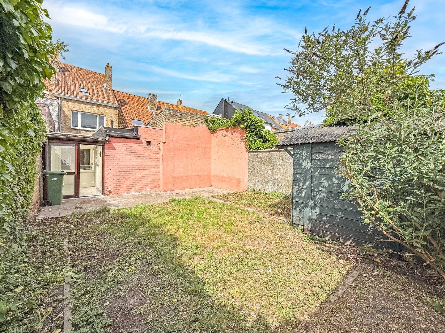 Instapklare rijwoning met garage en zonnige tuin nabij marktplein (157 m²) foto 6