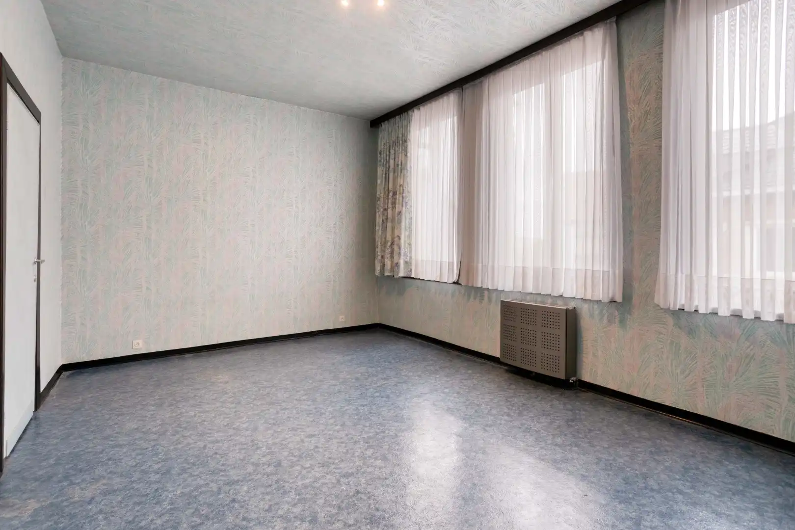 Te renoveren woning met tuin en garage in het centrum van Menen! foto 11