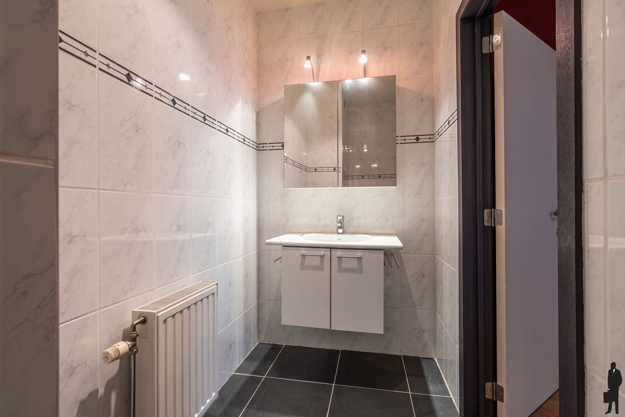 Welgelegen ruim GLVL app met 2 slpks, 2 badks, garage & tuin foto 15