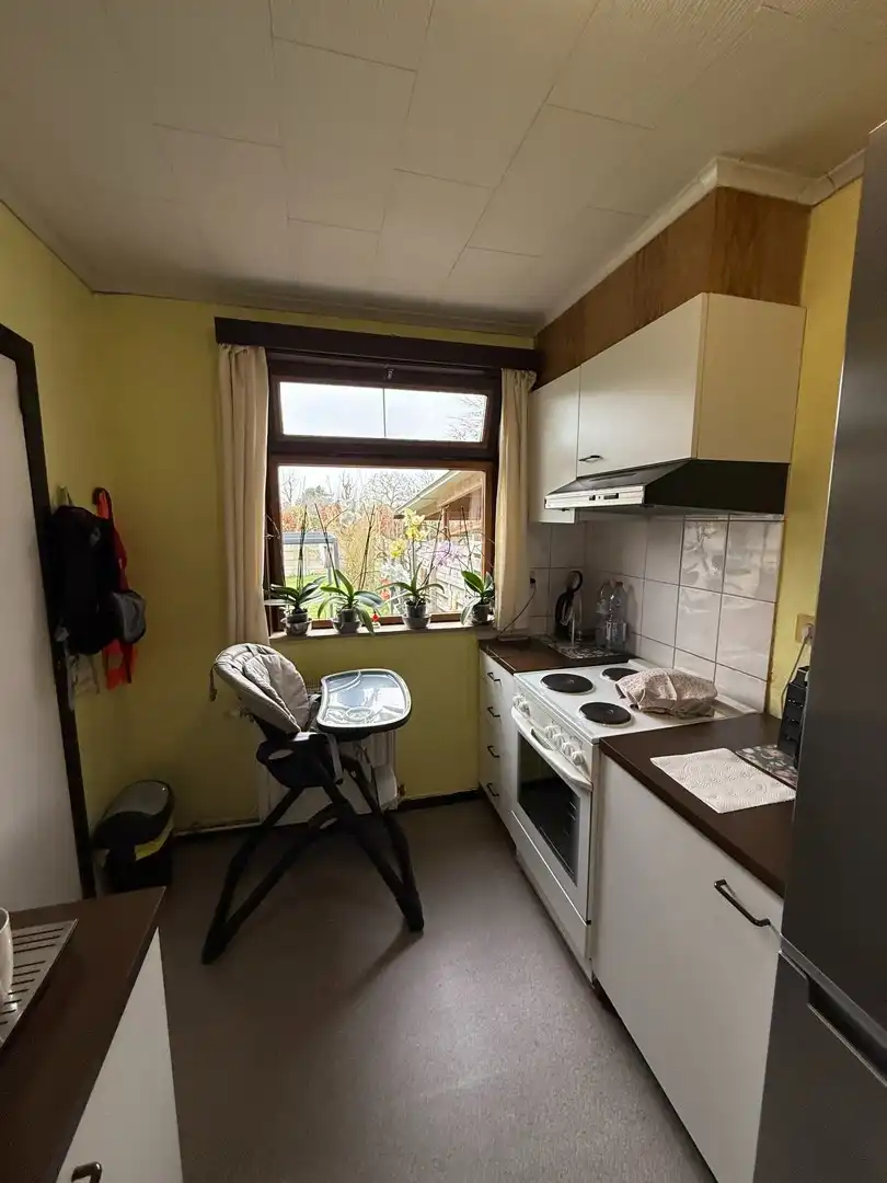 Opbrengsteigendom bestaande uit 2 halfopen woningen met garage en tuin te Hechtel. foto 27