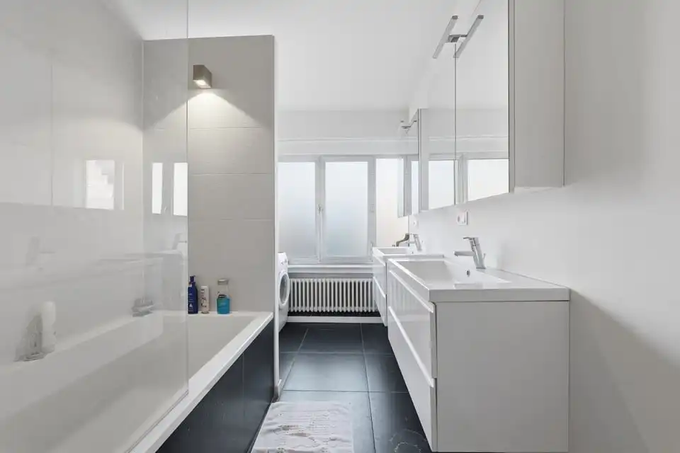 LICHTRIJK APPARTEMENT MET 2 SLKS IN HET CENTRUM VAN SINT-TRUIDEN foto 16