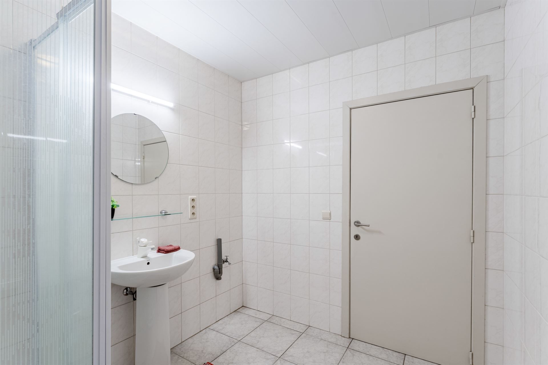 Gelijkvloers appartement met 1 slaapkamer foto 15