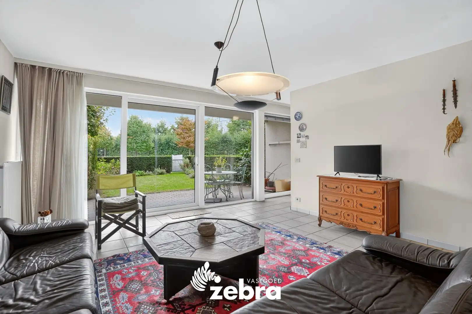 Gelijkvloers appartement met zuidoost gerichte tuin te Roeselare! foto 3