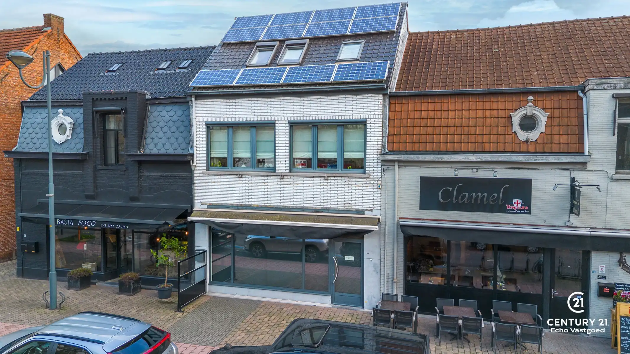 Handelszaak met gerenoveerde woonst op topligging  foto 18