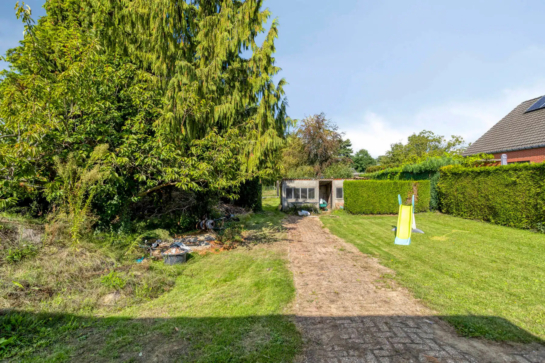 Ruime, energiezuinige gezinswoning met prachtige tuin foto 25