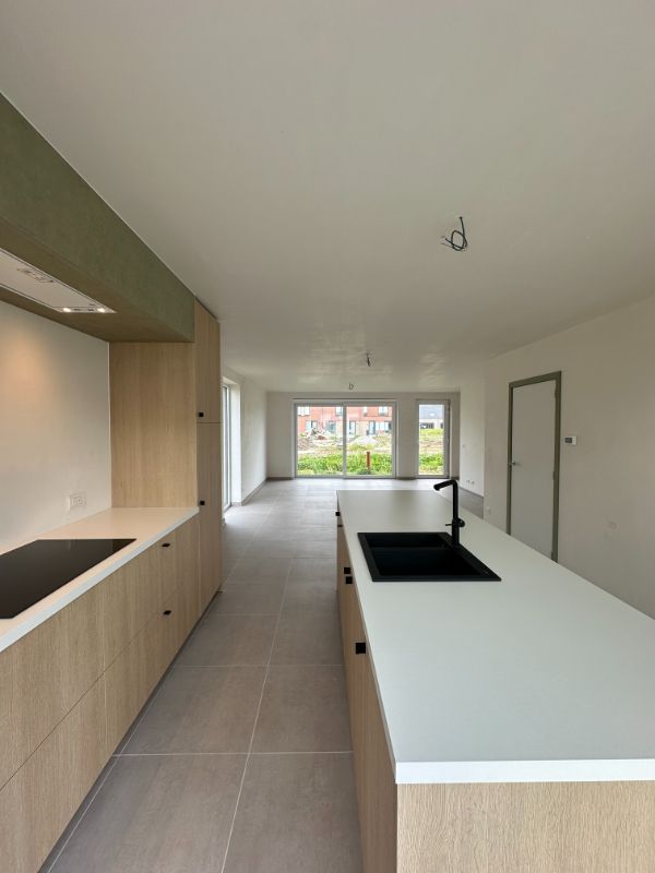 Instapklare nieuwbouwwoning met zonnige tuin te Roeselare foto 4