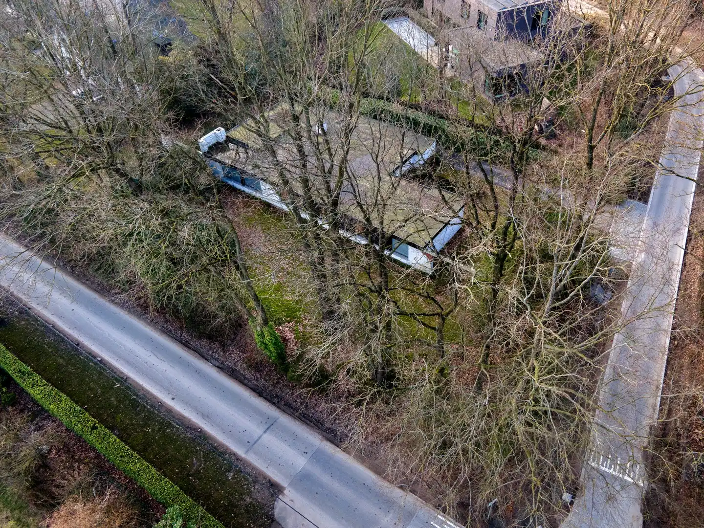 Bouwen aan de rand van Bellegembos. foto {{pictureIndex}}