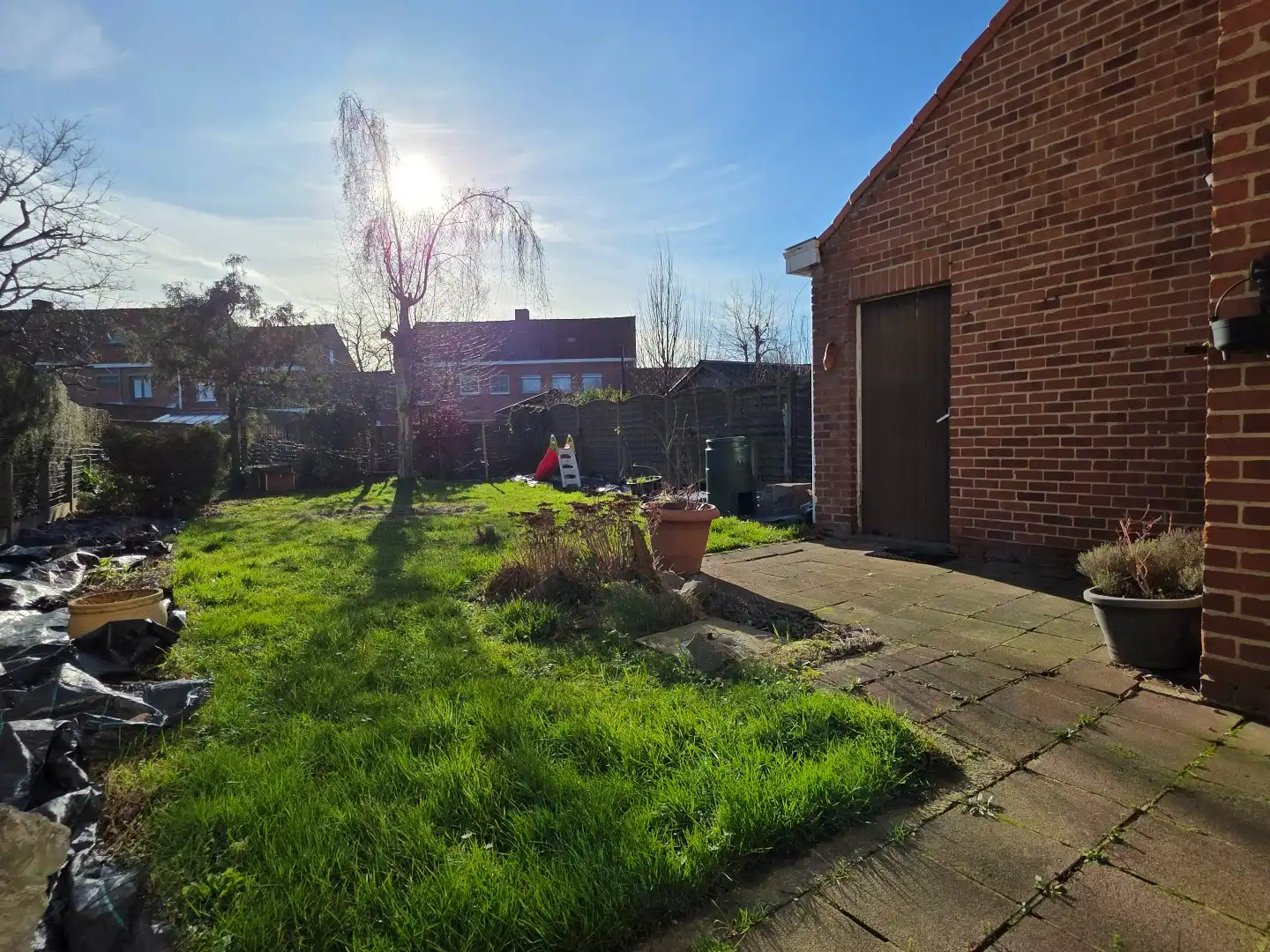 Stevige woning met betonstructuur te koop in Kuurne, eerste verdiep al volledig gerenoveerd foto 20