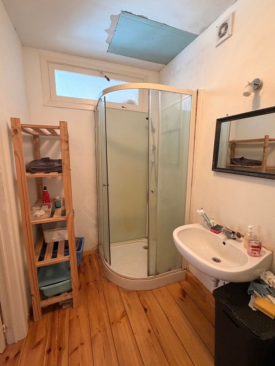 TE KOOP: Opbrengsteigendom met 3 appartementen en garage foto 12