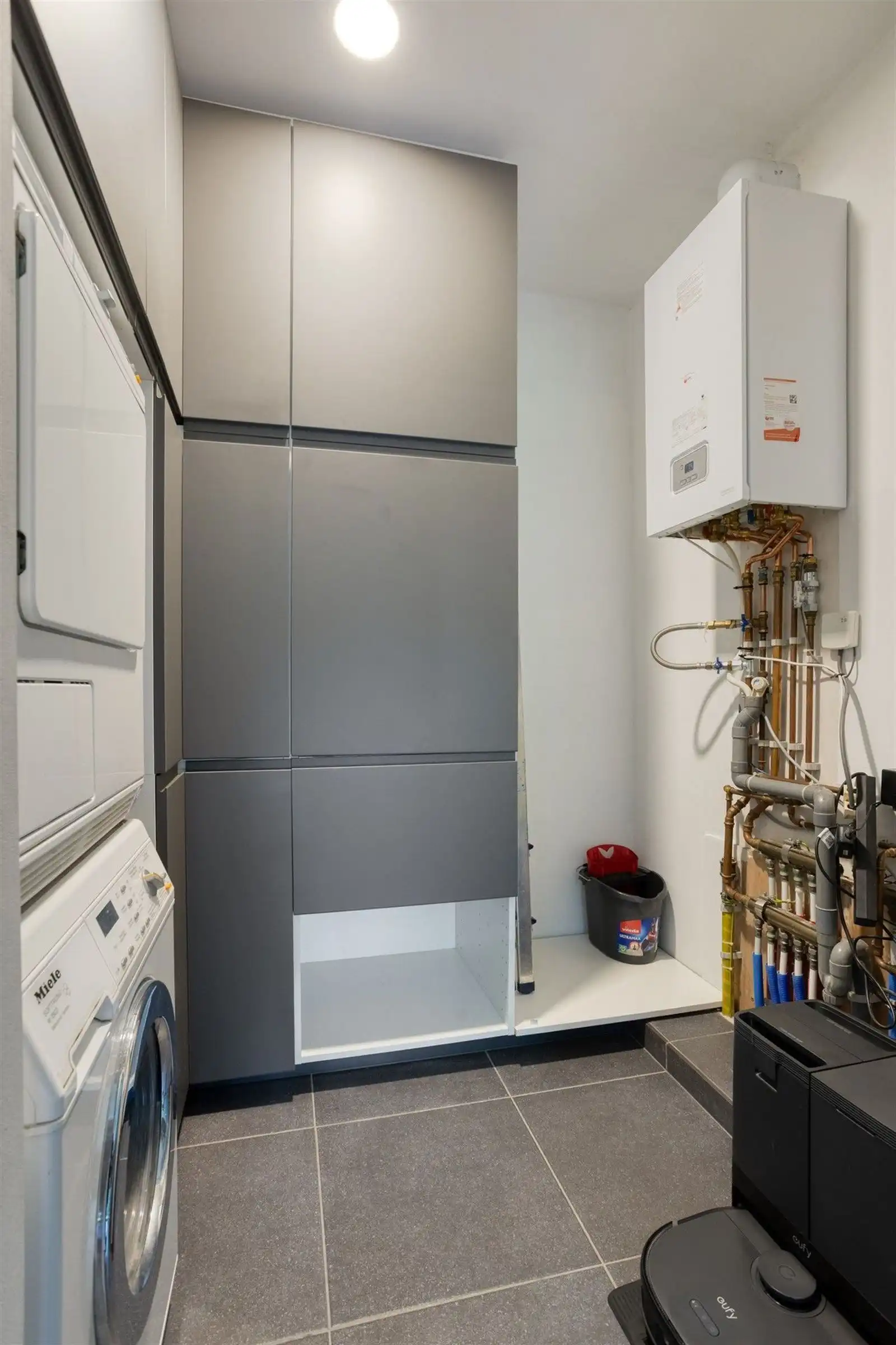 Gelijkvloers appartement met 2 slaapkamers en tuin, kelder & staanplaats foto 13