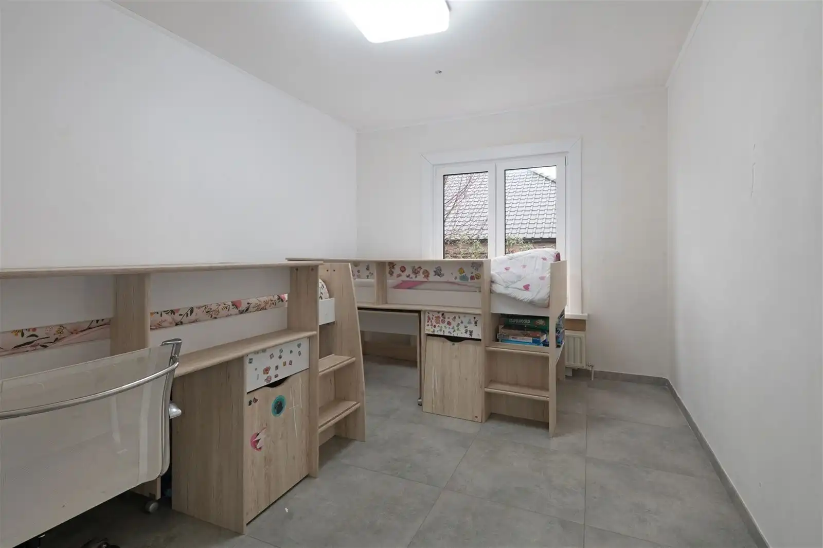 Instapklare gezinswoning met tuin en garage nabij centrum foto 12