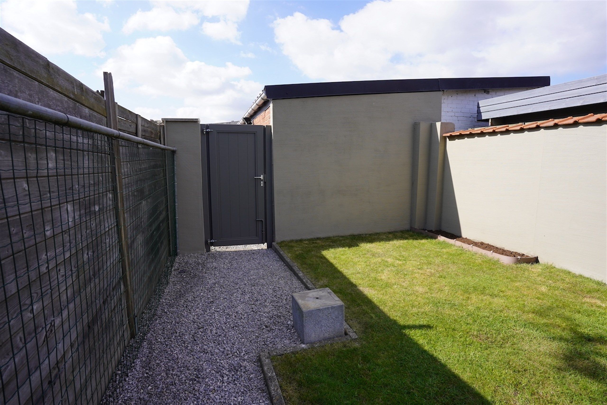 Instapklare woning met mooie tuin en privé garage achteraan foto 10