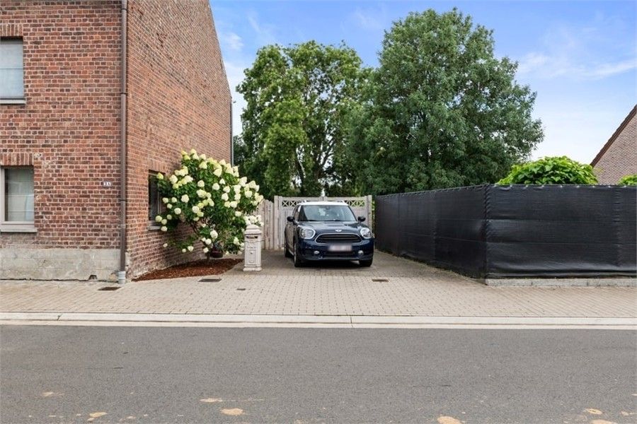 CHARMANTE GEZINSWONING OP EEN RUIM PERCEEL IN BUVINGEN foto 31