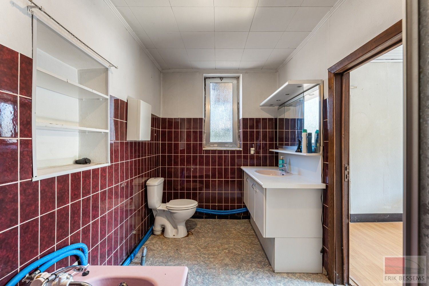 Charmante renovatiewoning met authentieke details en karaktervolle gevel. foto 10