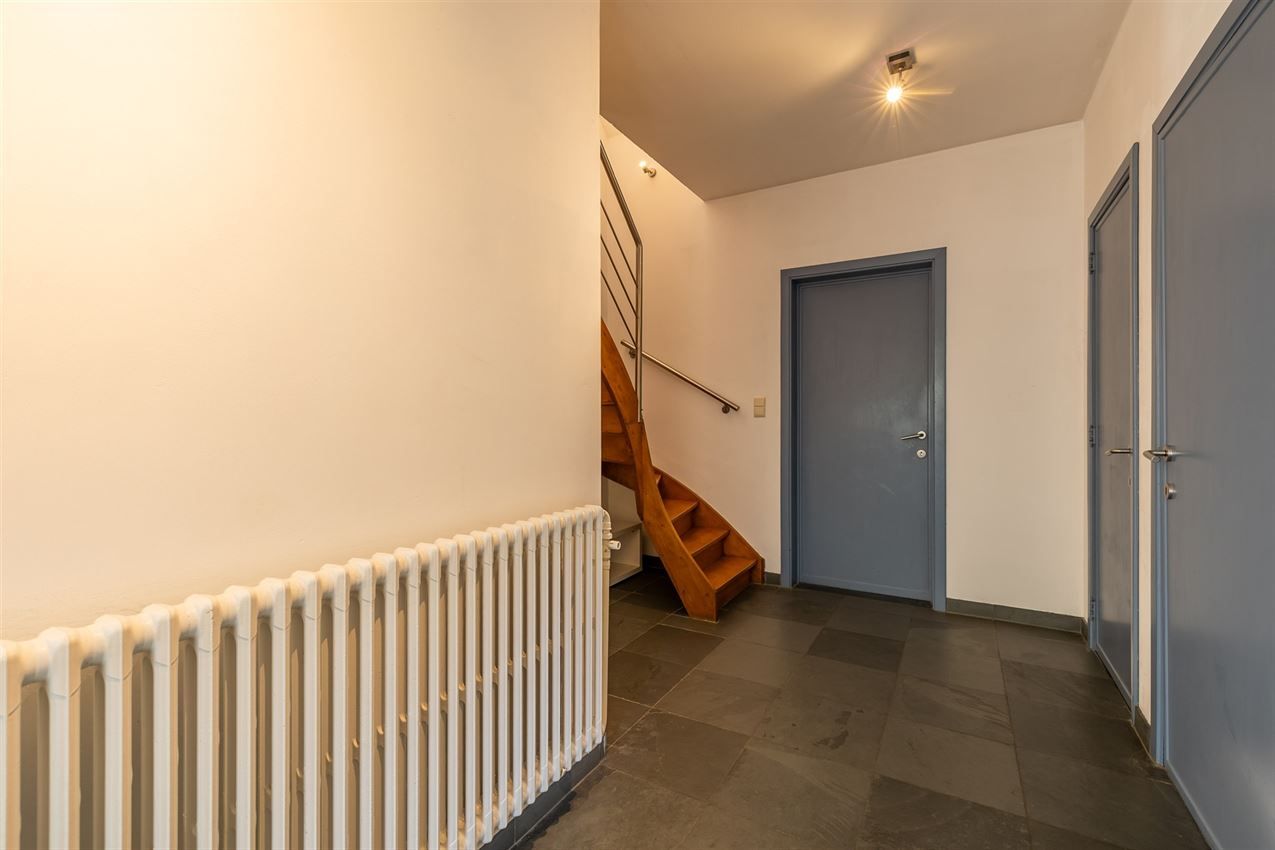 Charmante opgefriste woning op geliefde ligging met 3slk. foto 14