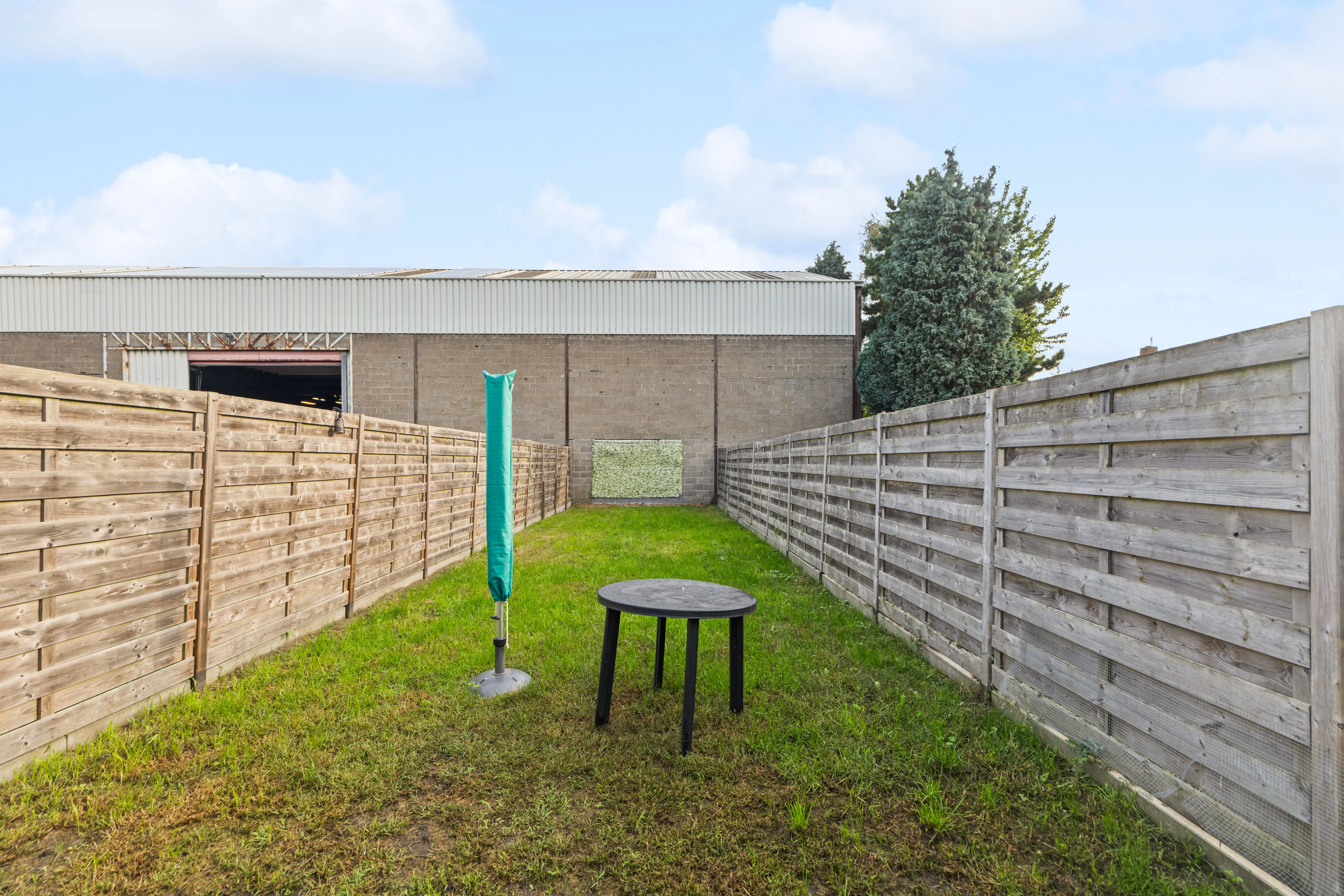 Instapklare starterswoning met tuin nabij centrum Zelzate foto 12